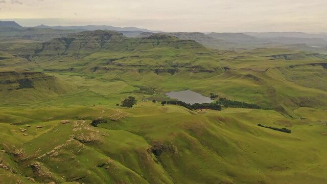 Vast green Umgeni Valley with small Umgeni River pond in KwaZulu Natal Midlands, South Africa - Aerial Fly-over
