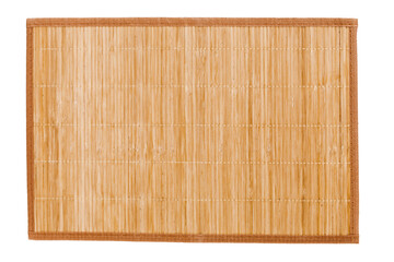 Naklejka na ściany i meble Bamboo straw serving mat isolated over white background.