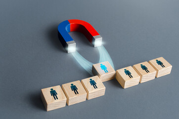 Magnet pulls a person out of row blocks. Choosing best candidate for hiring. Competition for a working high position of a manager. Poaching participants from other company team. Luring concept