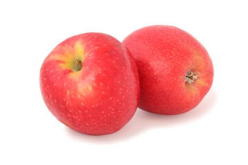 Two ripe red apples isolated on white