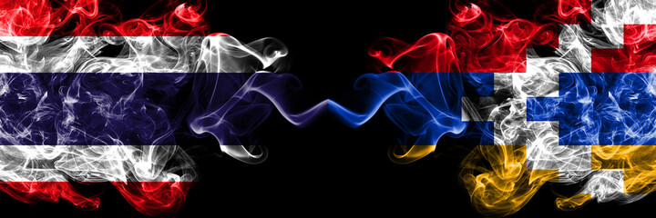 Thailand, Thai vs Artsakh, Artsakhtsi, Nagorno Karabakh smoky mystic flags placed side by side. Thick colored silky abstract smokes flags.