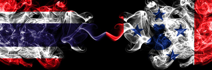 Thailand, Thai vs Austral Islands smoky mystic flags placed side by side. Thick colored silky abstract smokes flags.