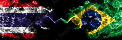 Thailand, Thai vs Brazil, Brazilian smoky mystic flags placed side by side. Thick colored silky abstract smokes flags.