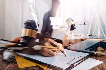 Business and lawyers discussing contract papers with brass scale on desk in office. Law, legal services, advice, justice and law concept picture with film grain effect