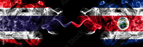 Thailand, Thai vs Costa Rica, coat smoky mystic flags placed side by side. Thick colored silky abstract smokes flags.