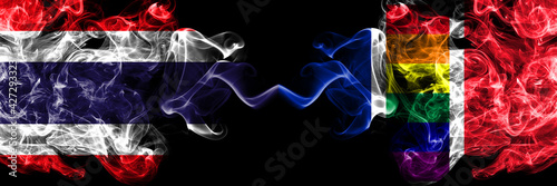 Thailand, Thai vs France Gay flag smoky mystic flags placed side by side. Thick colored silky abstract smokes flags.