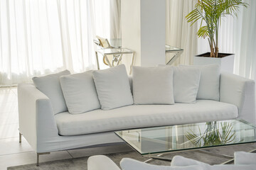 Living room with white sofa in hotel. Modern sofa in luxury villa
