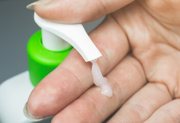 Hand soap close up. Cleaning and Disinfecting hands sanitizer gel. Prevention flu and virus disease.