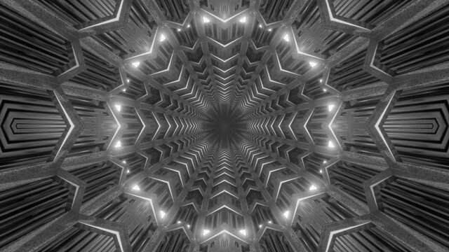 A silver metallic tunnel of star shapes with a light wandeirng in the distane. Vj loop with a slow motion