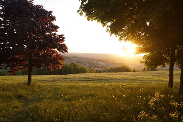 sunset over the hill
