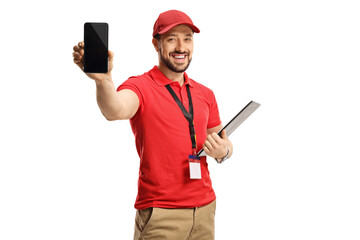 Male worker in a red t-shirt showing a smartphone