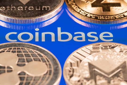 Coinbase crypto exchange logo on screen with altcoins. Ljubljana, Slovenia - April 12 2021