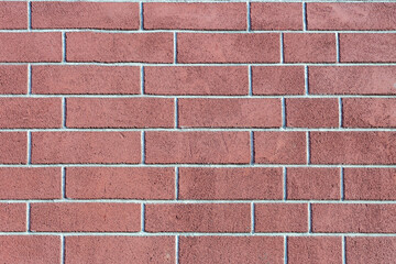 brick wall of bricks of different sizes as the background