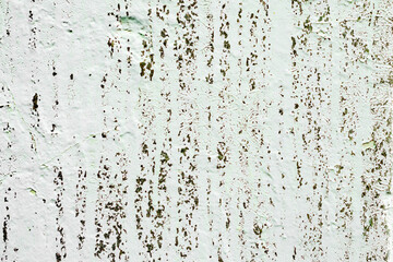Texture of a concrete wall with cracks and scratches which can be used as a background