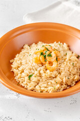 Portion of risotto with prawn