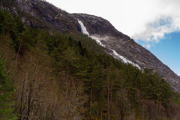 Langfossen, a waterfall located in the municipality of Etne in Vestland County, Norway, Scandinavia