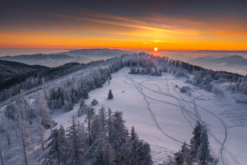 Winter morning in Gorce on the tower on the top of Lubań. A beautiful, romantic atmosphere with a view of the Pieniny Mountains, the Beskids and the Tatra Mountains.
