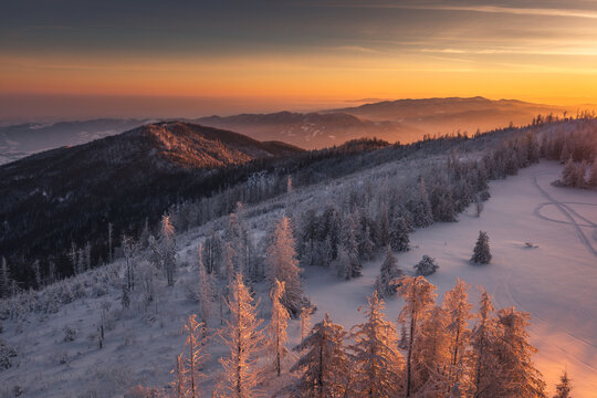 Winter morning in Gorce on the tower on the top of Lubań. A beautiful, romantic atmosphere with a view of the Pieniny Mountains, the Beskids and the Tatra Mountains. © PawelUchorczak