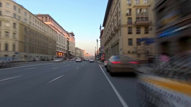 Bike ride along one of the central streets of Moscow and nearby alleys, time lapse