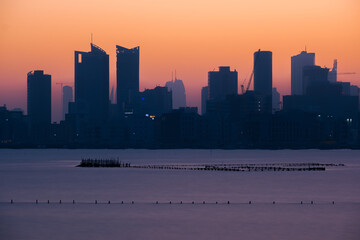 city skyline at sunrise