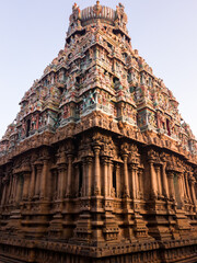 An ornately carved tower spire of the ancient Hindu temple complex of Meenakashi Amman in the city of Madurai.