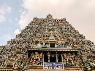 A gopuram tower of the ancient Hindu temple complex of Meenakashi Amman in the city of Madurai.