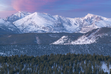 Winter landscape at sunrise of the snow flocked Rocky Mountains, Rocky Mountain National Park, Colorado, USA
