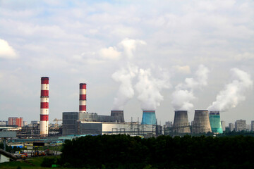 The smoking and soaring chimneys of a large industrial city