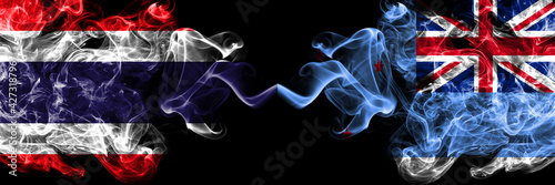 Thailand, Thai vs New Zealand, Ross Dependency smoky mystic flags placed side by side. Thick colored silky abstract smokes flags.