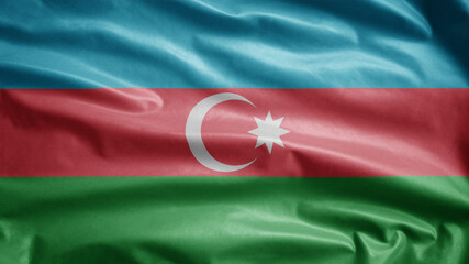 Azerbaijani flag waving in the wind. Azerbaijan banner blowing, soft silk.