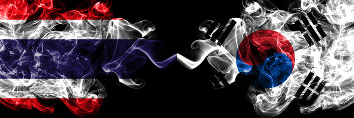 Thailand, Thai vs South Korea, Korean smoky mystic flags placed side by side. Thick colored silky abstract smokes flags.