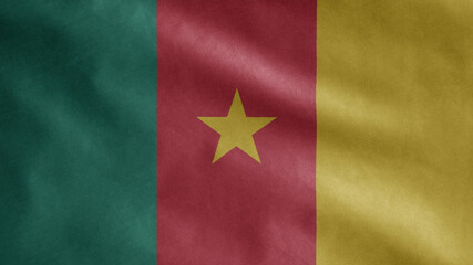 Cameroonian flag waving in the wind. Close up Cameroon banner blowing soft silk.