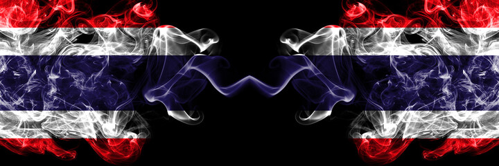 Thailand, Thai vs Thailand, Thai smoky mystic flags placed side by side. Thick colored silky abstract smokes flags.