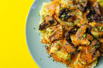 Fresh egg pasta with ricotta cheese and porcini mushrooms paste filling, delicious tortelloni