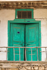 Front still image of the wooden doors of an abandoned old historic Turkish House. 