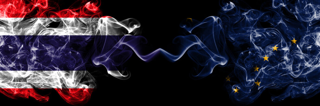 Thailand, Thai vs United States of America, America, US, USA, American, Alaska, Alaskan smoky mystic flags placed side by side. Thick colored silky abstract smokes flags.
