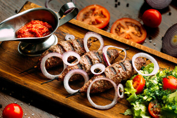 Pork kebabs, bbq meat on plate, close up