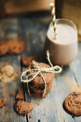 a bunch of chocolate chip cookies. Americano cookies near hot cocoa drink.