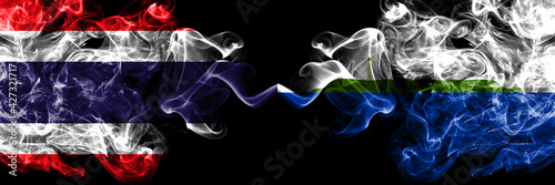 Thailand, Thai vs United States of America, America, US, USA, American, Navassa Island smoky mystic flags placed side by side. Thick colored silky abstract smokes flags.