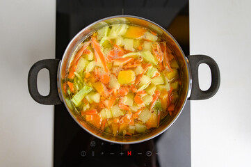 Cooking Bright Vegetable Soup on the Stove