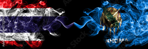 Thailand, Thai vs United States of America, America, US, USA, American, Oklahoma smoky mystic flags placed side by side. Thick colored silky abstract smokes flags.