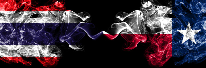 Thailand, Thai vs United States of America, America, US, USA, American, Texas smoky mystic flags placed side by side. Thick colored silky abstract smokes flags.
