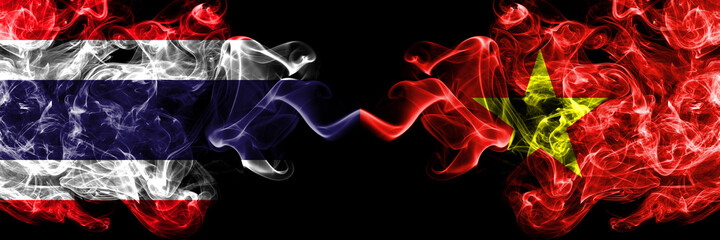 Thailand, Thai vs Vietnam smoky mystic flags placed side by side. Thick colored silky abstract...