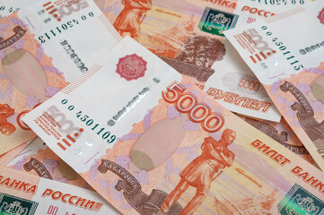 5000 rubles background. Russian banknotes at different angles.