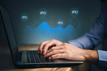 Businessman working with laptop technology online IPO