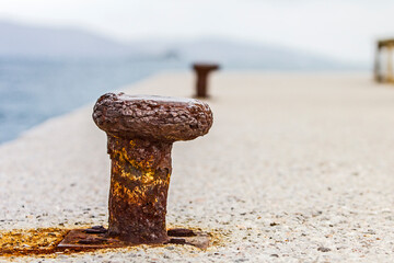 Rusted bollard still image.