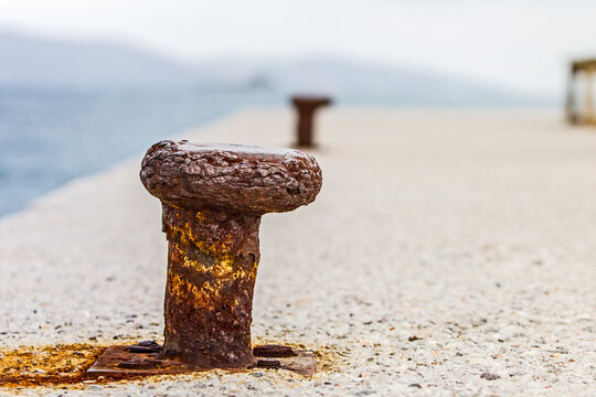 Rusted bollard still image.