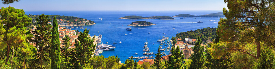 Coastal summer landscape, panorama - top view of the City Harbour of the town of Hvar and Paklinski Islands, the island of Hvar, the Adriatic coast of Croatia