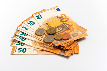 Euro banknotes pile, European money currency nominal fifty euros, isolated on white