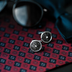 Men's cufflinks with breastplate close up.